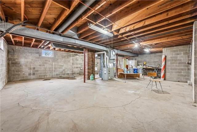 basement featuring heating unit