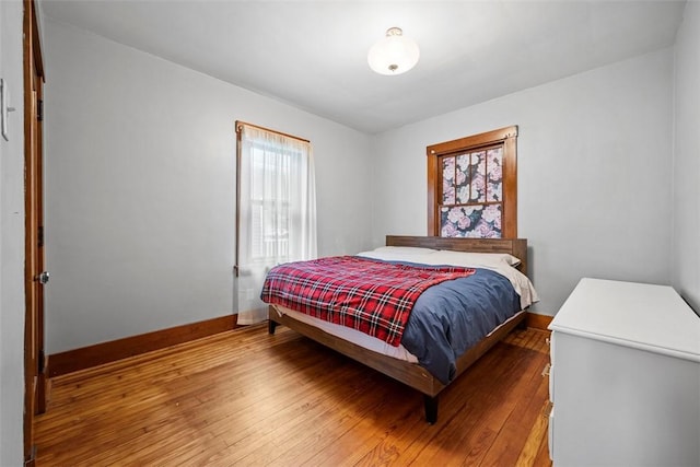 bedroom featuring wood-type flooring