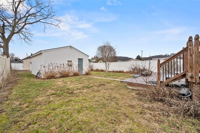 view of yard featuring a wooden deck