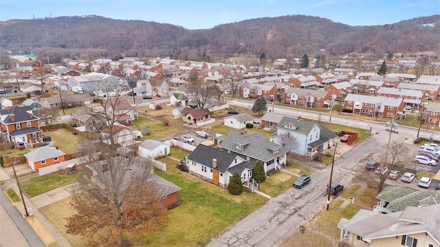 drone / aerial view featuring a mountain view