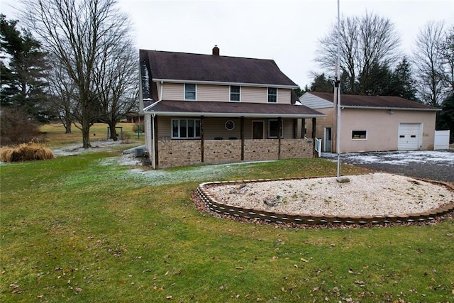 view of front property with a garage and a front yard