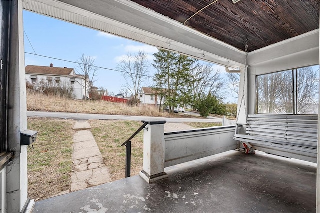 view of yard with covered porch