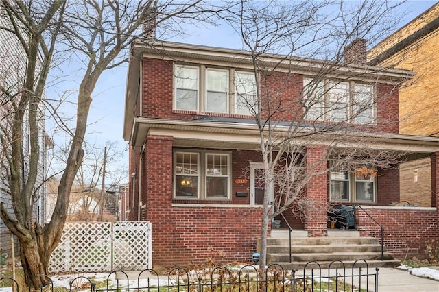 view of front of home featuring covered porch