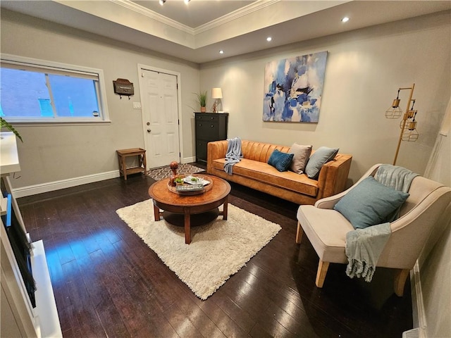 living room with crown molding and dark hardwood / wood-style flooring