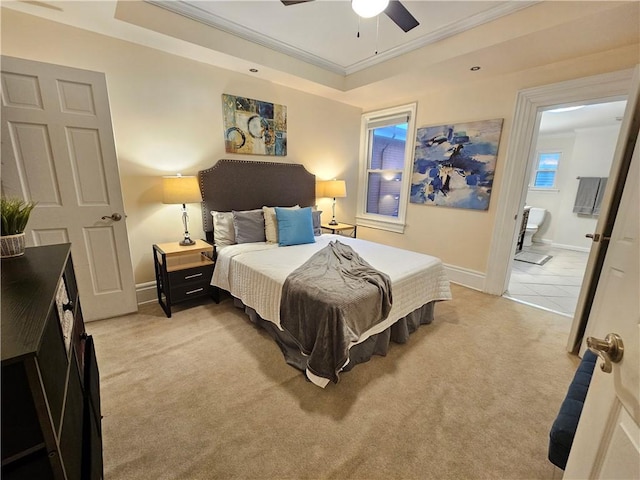 carpeted bedroom featuring ceiling fan, ornamental molding, and connected bathroom