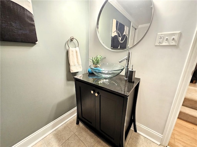 bathroom with tile patterned floors and vanity