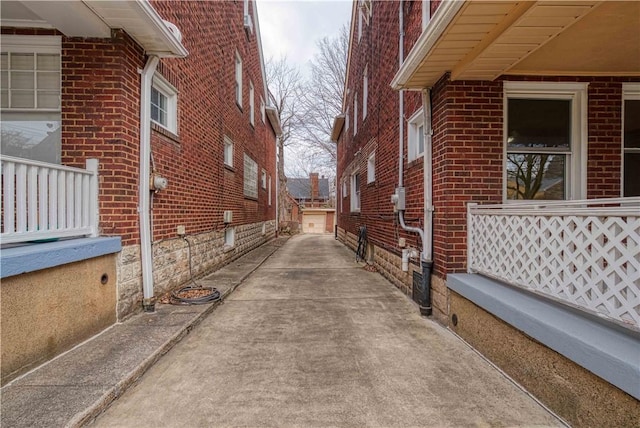 view of home's exterior with brick siding