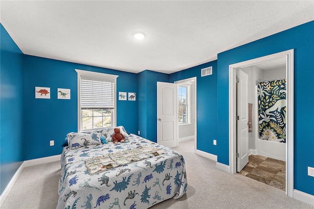 bedroom with light carpet