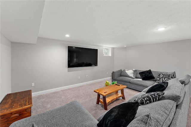 living room featuring carpet and a textured ceiling