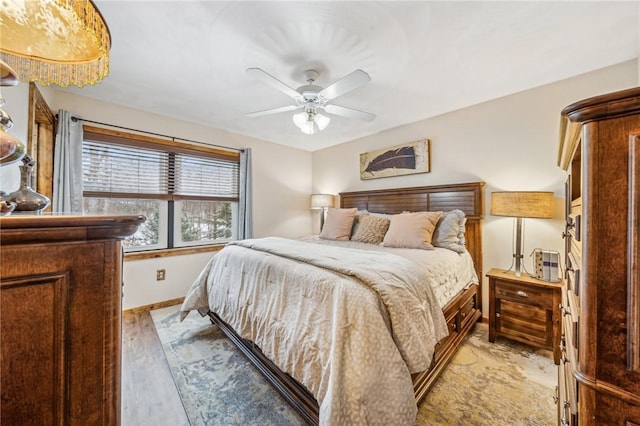 bedroom featuring ceiling fan and light wood-type flooring