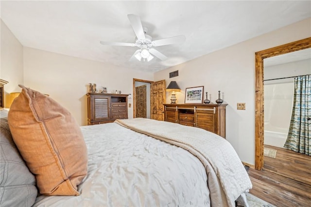 bedroom featuring hardwood / wood-style flooring and ceiling fan