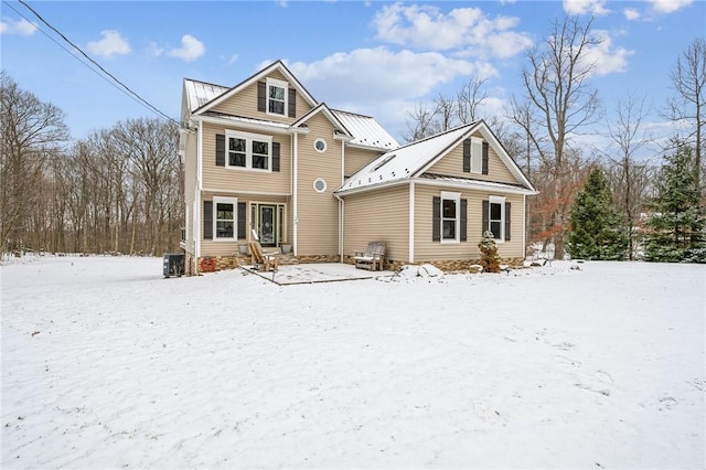 view of snow covered property