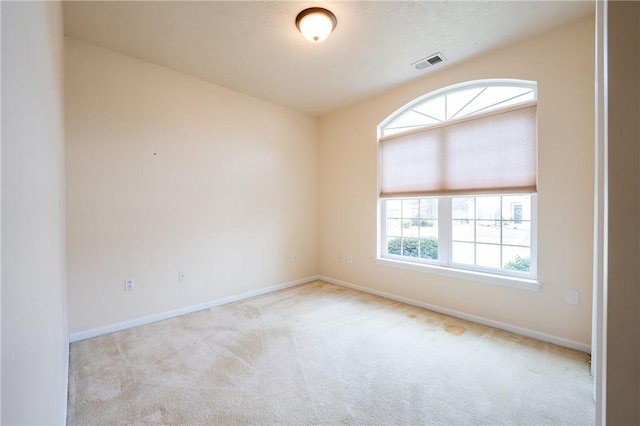 view of carpeted spare room