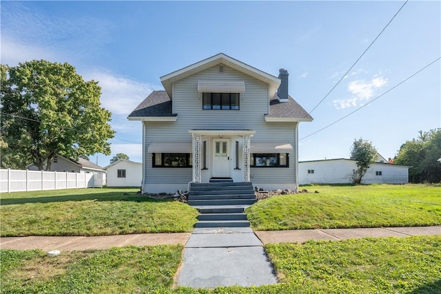 view of front of home featuring a front yard