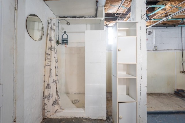 bathroom with a shower with shower curtain