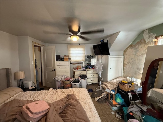 bedroom with lofted ceiling, carpet flooring, and ceiling fan