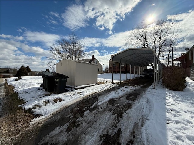 exterior space with a carport