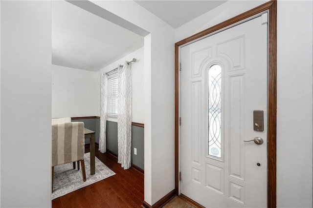 foyer entrance featuring dark hardwood / wood-style flooring