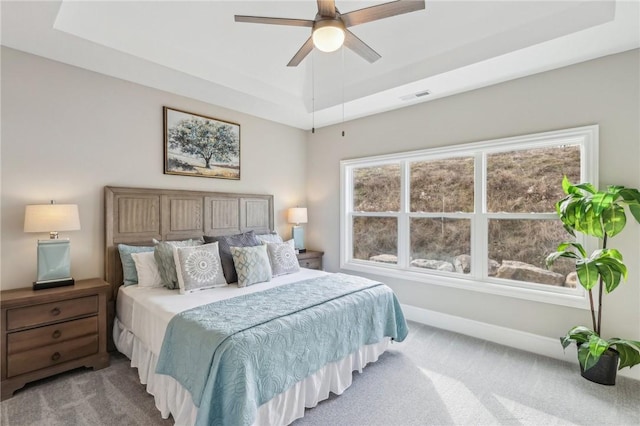 1045 Lakeside Dr, Mcdonald Wsh, PA 15057 - carpeted bedroom with a raised ceiling and ceiling fan