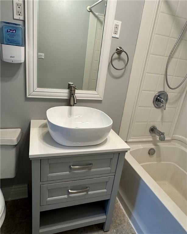 full bathroom with shower / washtub combination, toilet, and vanity