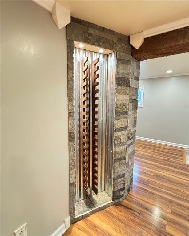 interior details featuring hardwood / wood-style flooring