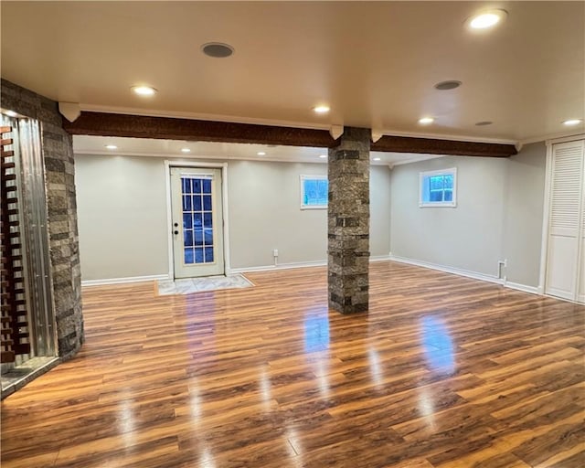 basement featuring hardwood / wood-style floors