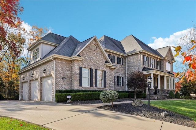 view of front facade with a garage and a front yard