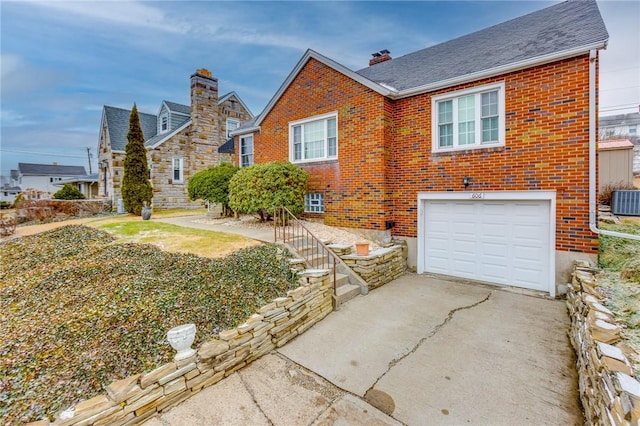 view of front of property with a garage