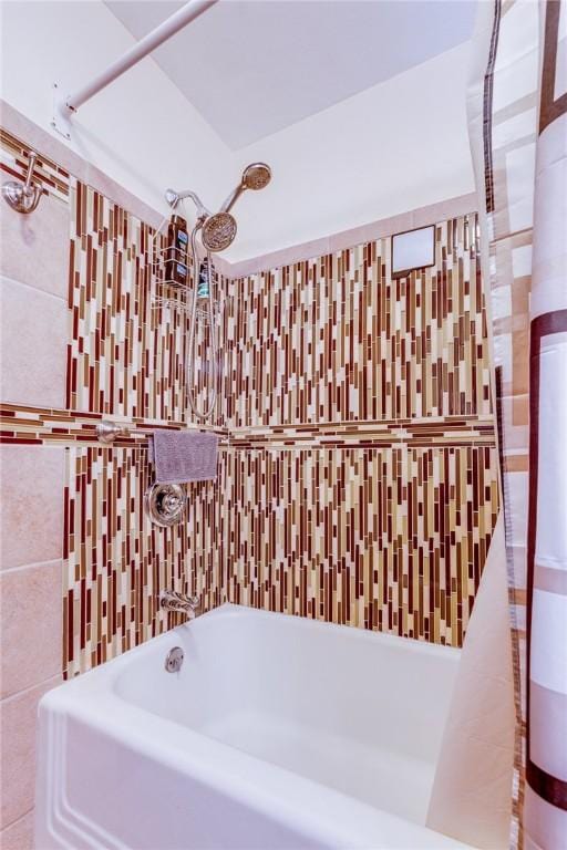 bathroom with tile walls