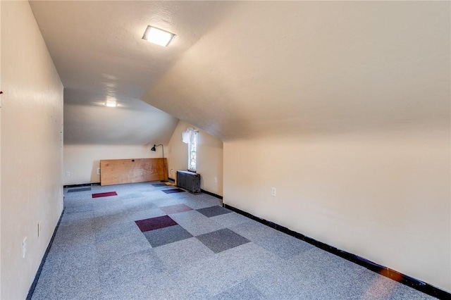 bonus room with lofted ceiling