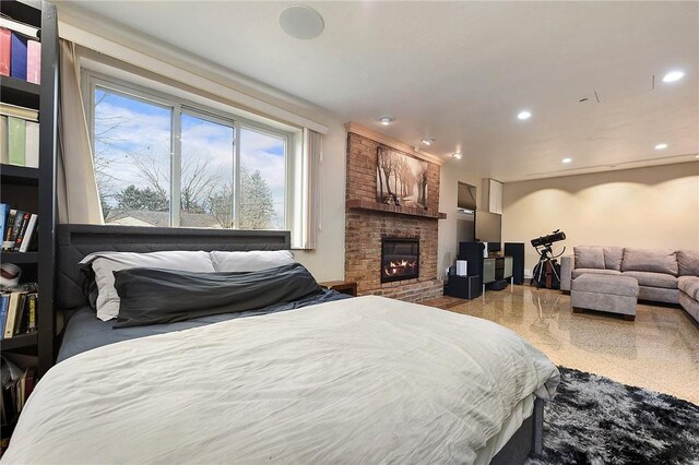 bedroom featuring a fireplace