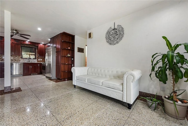 living room featuring ceiling fan