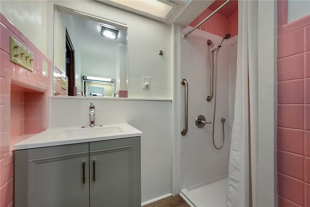 bathroom featuring vanity and walk in shower