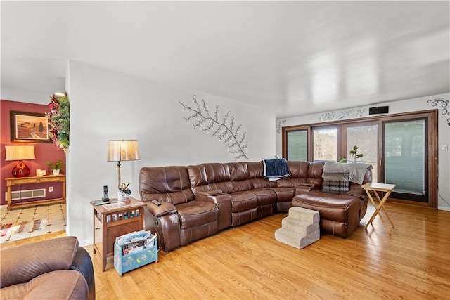 living room with light hardwood / wood-style floors