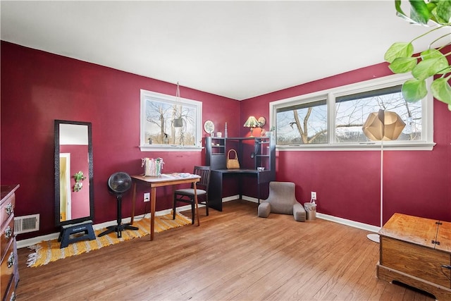 interior space with hardwood / wood-style flooring