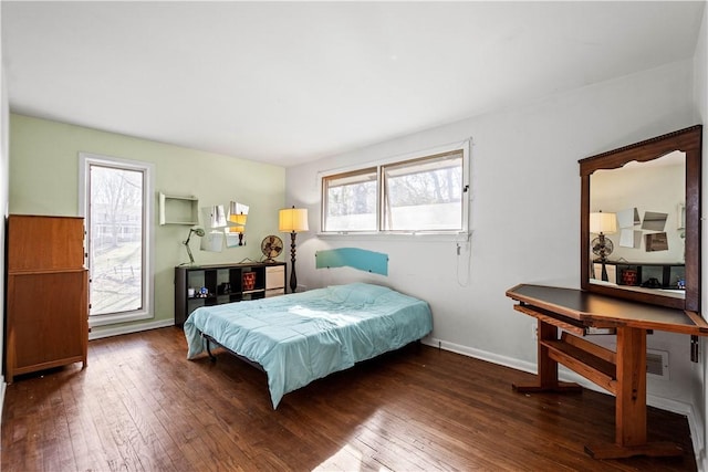 bedroom featuring dark wood-type flooring