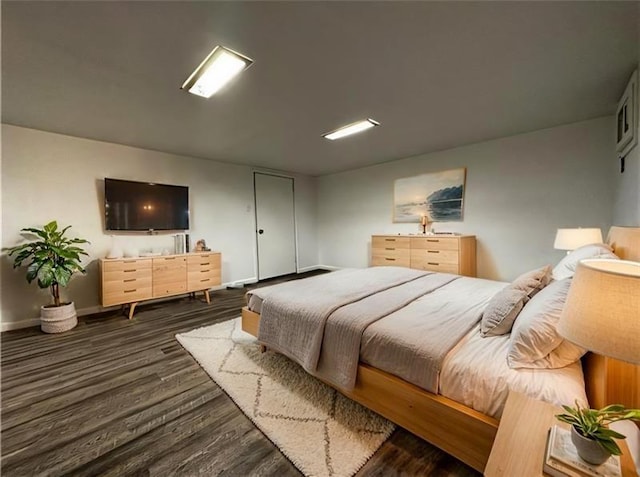 bedroom featuring dark hardwood / wood-style floors