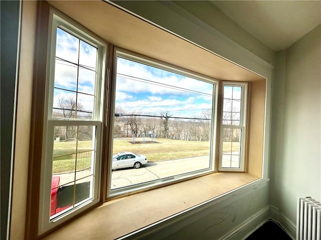 entryway featuring radiator