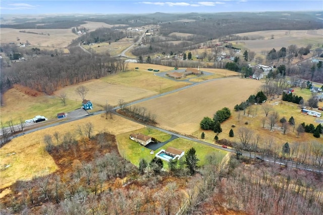 birds eye view of property featuring a rural view