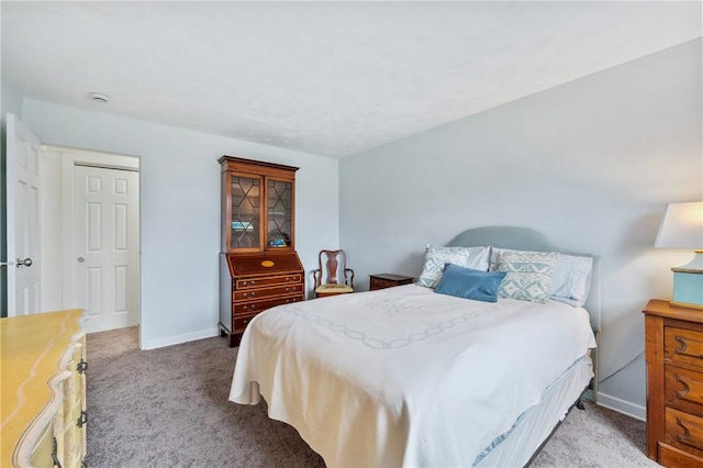 bedroom with light colored carpet