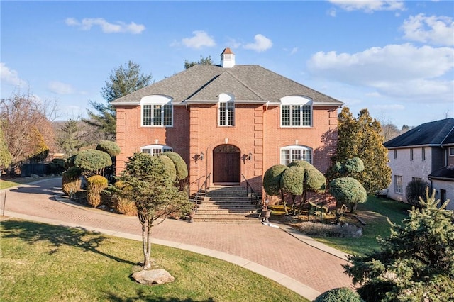 view of front of house with a front lawn