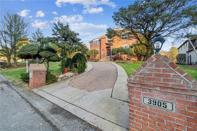 view of front of home with a front yard