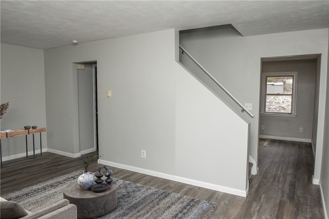 interior space with dark hardwood / wood-style flooring