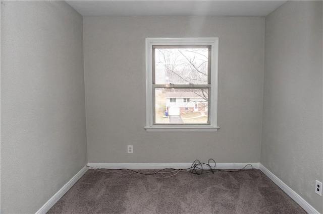 unfurnished room with carpet