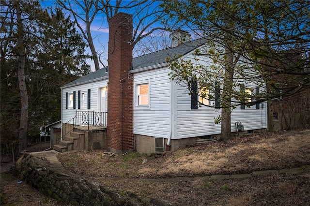 view of property exterior at dusk