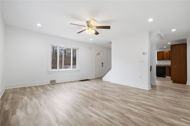 unfurnished living room with ceiling fan, recessed lighting, visible vents, baseboards, and light wood-type flooring