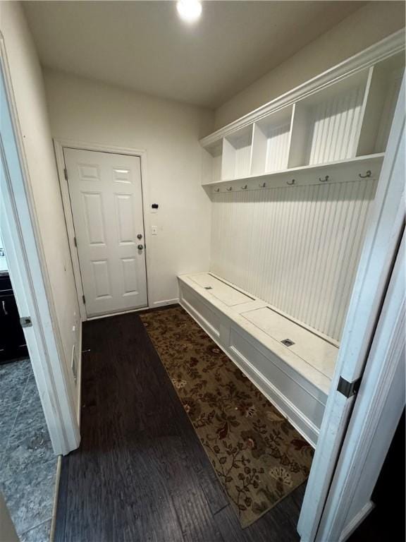 mudroom featuring dark wood-type flooring