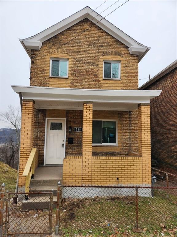568 Stokes Ave N, Braddock, PA 15104 - view of front of home featuring a porch