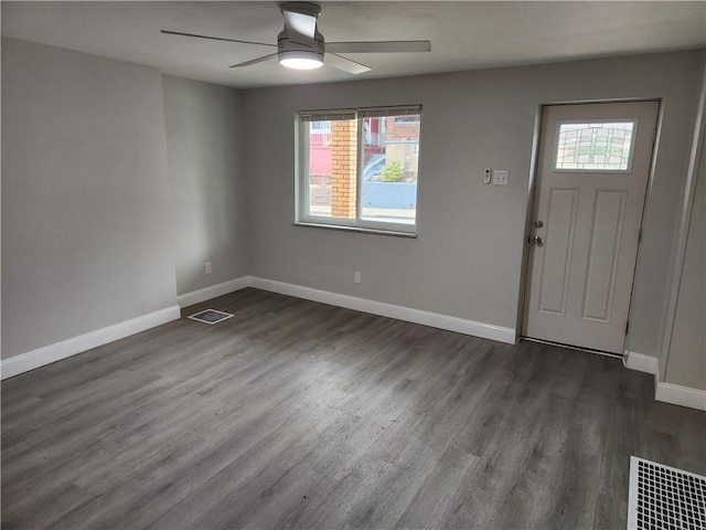 foyer featuring dark hardwood / wood-style floors and ceiling fan