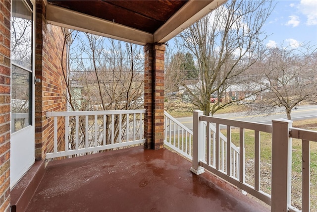 balcony featuring a porch